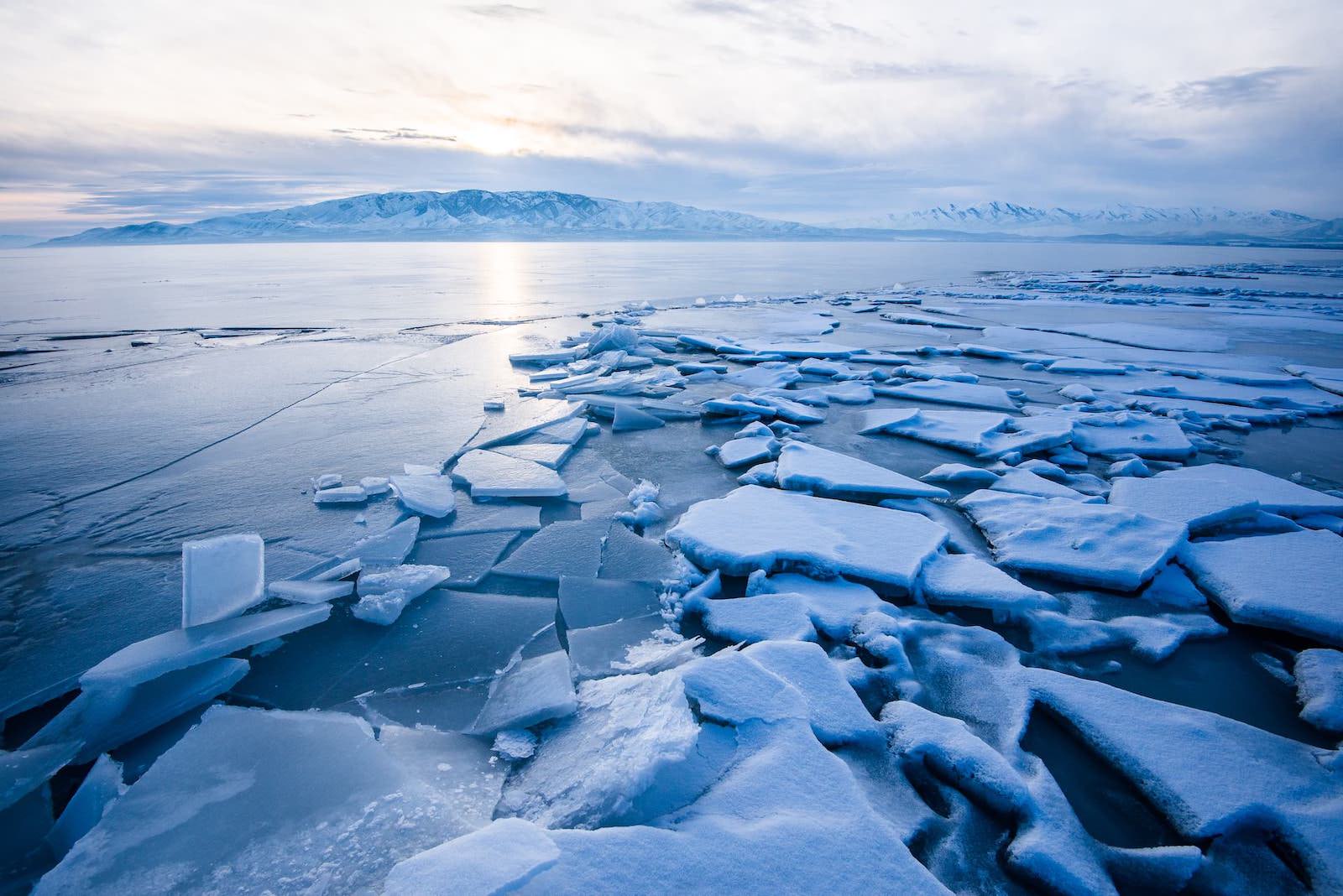 A photo of Utah Lake covered in sheets of broken ice 